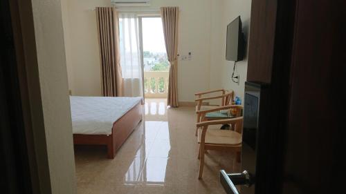 Μια τηλεόραση ή/και κέντρο ψυχαγωγίας στο Camellia Hotel