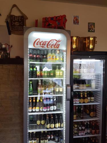 an open refrigerator filled with lots of drinks at Panama RIO in Waulsort
