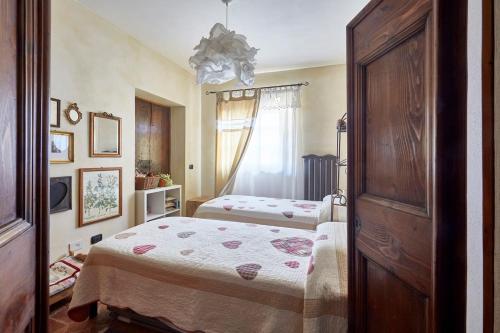 Postel nebo postele na pokoji v ubytování Il vecchio fienile