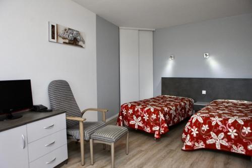 Ένα ή περισσότερα κρεβάτια σε δωμάτιο στο LES TERRASSES DE BORDA***