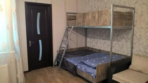 Llit o llits en una habitació de Эдем