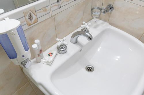 Et badeværelse på Apart Hotel Rivadavia 815