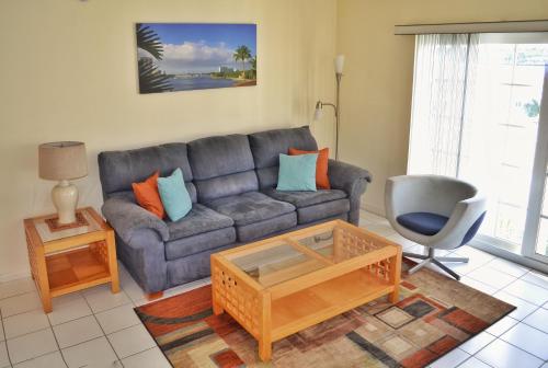 a living room with a couch and a chair at Fort Lauderdale Yacht and Beach Club 416 in Fort Lauderdale