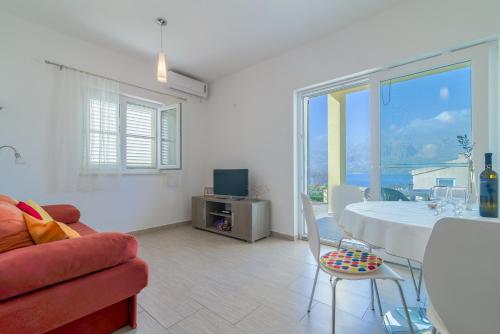 Televisyen dan/atau pusat hiburan di Apartmani Jelić