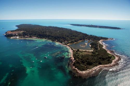 an aerial view of an island in the ocean at Novotel Suites Cannes Centre in Cannes
