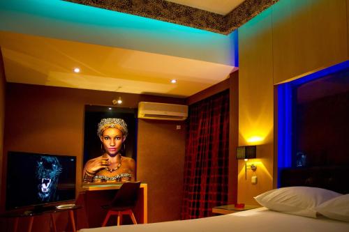 TV a/nebo společenská místnost v ubytování Olympic Hotel