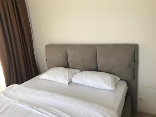 Кровать или кровати в номере Medıkule(6) 1+1
