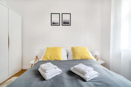 Кровать или кровати в номере Gold Apartments Your Holiday Home RODZINNY 3