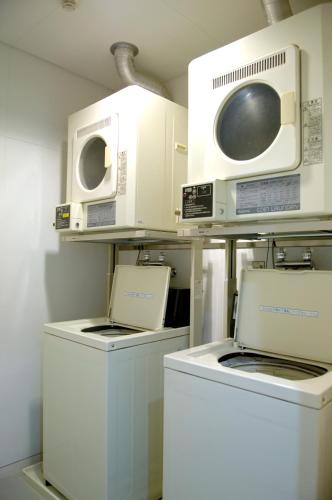 a laboratory with three microwaves and washers on shelves at Sunhills Sarai in Shintotsukawa