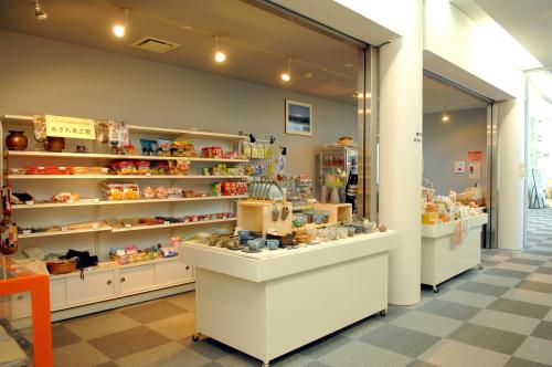 a store with shelves of items in a store at Sunhills Sarai in Shintotsukawa