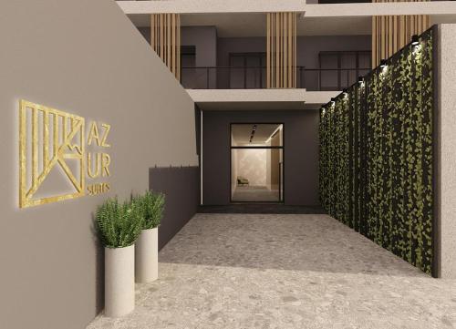 a hallway of a building with a sign on the wall at Azur Suites in Athens
