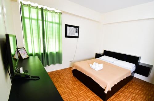 Krevet ili kreveti u jedinici u objektu Casa Blanca Apartment