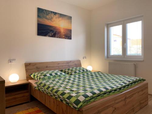 Postel nebo postele na pokoji v ubytování Apartmán Monny
