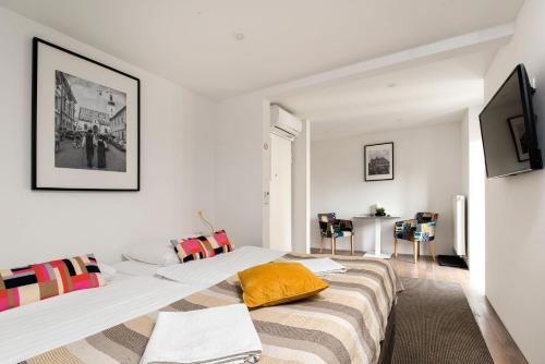 מיטה או מיטות בחדר ב-Tia Apartments and Rooms