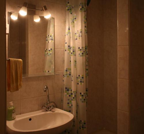 A bathroom at Royal Studio Apartment