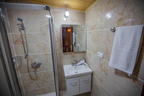 Koupelna v ubytování Capiedra Hotel
