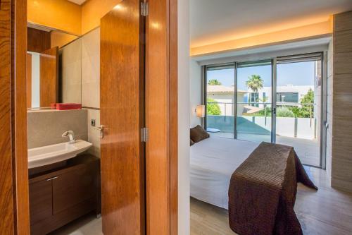 Ένα ή περισσότερα κρεβάτια σε δωμάτιο στο Villa Agusmar