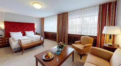 Un pat sau paturi într-o cameră la Hotel Engel
