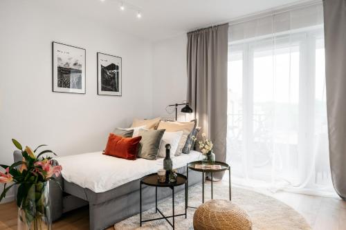 Lova arba lovos apgyvendinimo įstaigoje Garden Apartments by LoftAffair