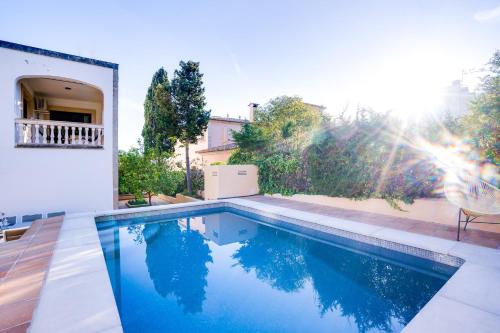 a swimming pool in the backyard of a house at VILLA BONANOVA by Priority in Palma de Mallorca