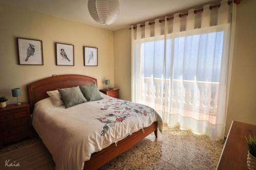 Postel nebo postele na pokoji v ubytování Villa La Tuna