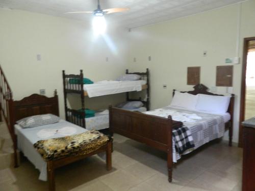 Postel nebo postele na pokoji v ubytování Fazenda Hotel Alvorada
