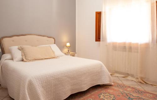 Katil atau katil-katil dalam bilik di favoloso appartamento in villa