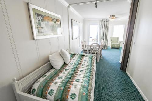a hotel room with a bed in a room at A Place at the Beach III in Atlantic Beach