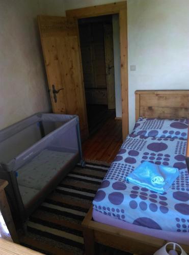 Postel nebo postele na pokoji v ubytování Penzión pod Magurou