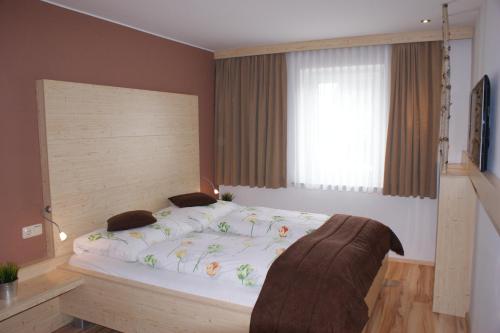 Hotel Apartment Das Au- Gutにあるベッド