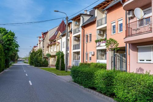 an empty street in an apartment complex at Bella Apartments No1 in Hajdúszoboszló