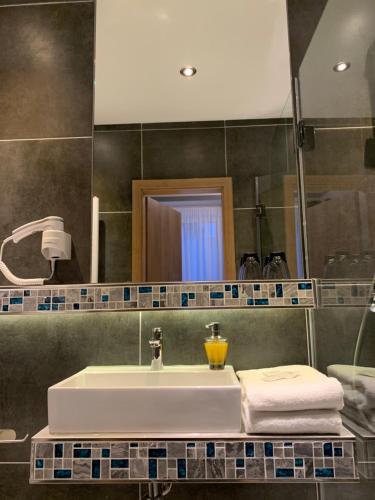 Ванна кімната в Hotel Dias
