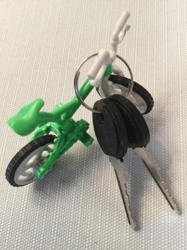 a toy bike with a pair of headphones on it at La Suite del Centro in Lazise
