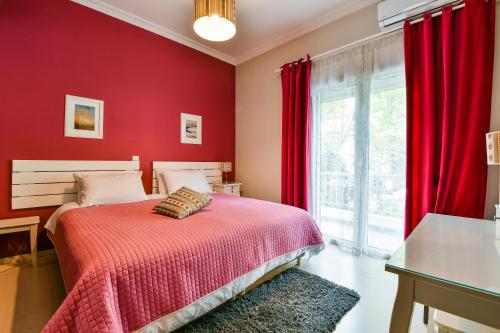 Postel nebo postele na pokoji v ubytování Star Acropolis Apartment