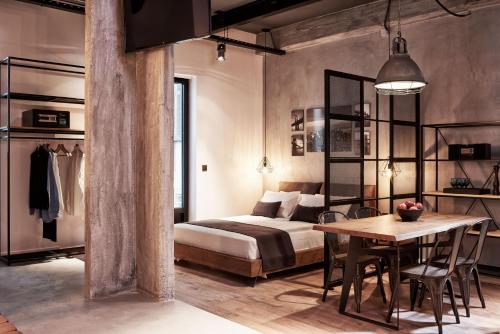 Posteľ alebo postele v izbe v ubytovaní Kolonaki 8 - Design Suites & Lofts