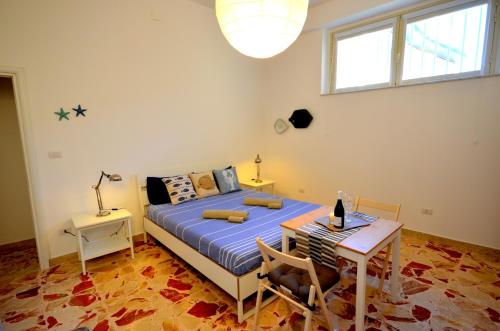 Un pat sau paturi într-o cameră la Casa Maja