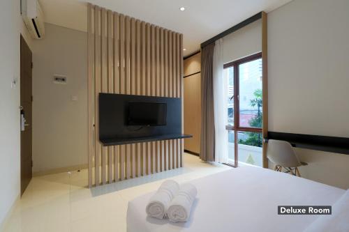 Katil atau katil-katil dalam bilik di Plaza 54 Residence Jakarta