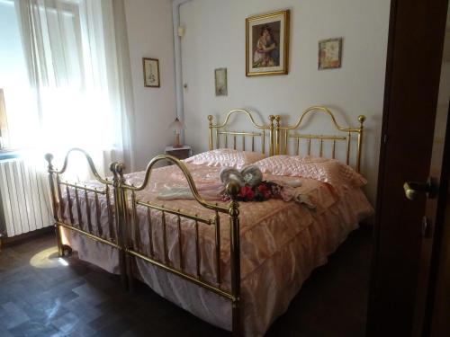 Posteľ alebo postele v izbe v ubytovaní Le Mimose B&B
