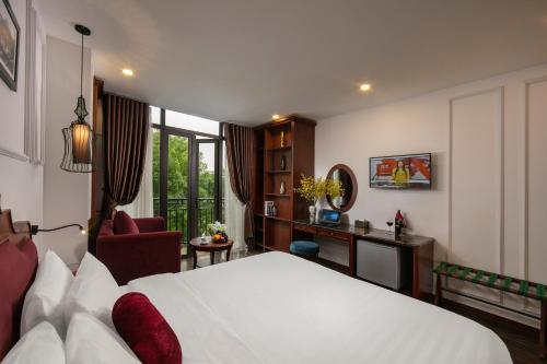 Postel nebo postele na pokoji v ubytování Hanoi Vision Premium Hotel