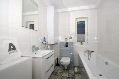 Kúpeľňa v ubytovaní Apartament RESORT Chełmońskiego Śrem