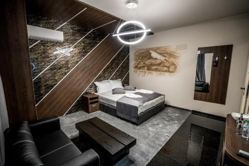 Ένα ή περισσότερα κρεβάτια σε δωμάτιο στο Boutique Guest house 7th Sense