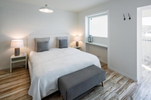 Postel nebo postele na pokoji v ubytování JR Studios & Suites I Rius I