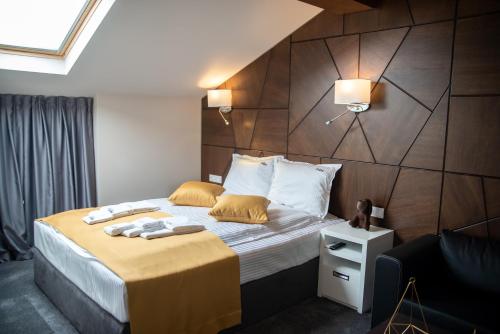 Ένα ή περισσότερα κρεβάτια σε δωμάτιο στο Boutique Guest house 7th Sense