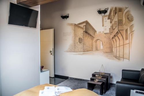Μια τηλεόραση ή/και κέντρο ψυχαγωγίας στο Boutique Guest house 7th Sense