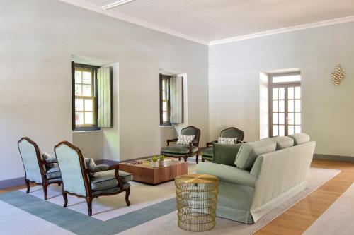 a living room with a couch and chairs at Central Monchique Hotel - Villa Termal Spa Resort - by Unlock Hotels in Monchique