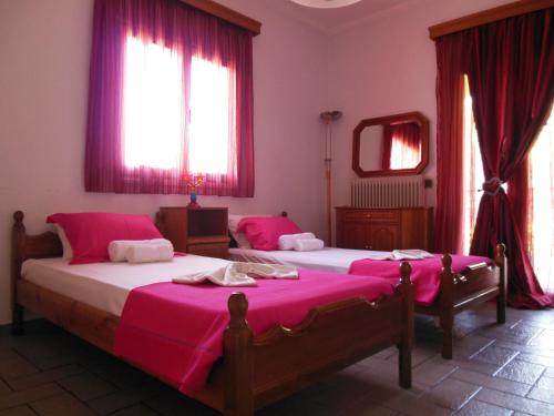 Postel nebo postele na pokoji v ubytování Lygies Apart Hotel