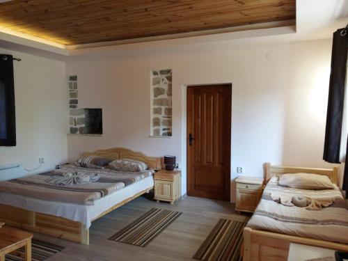 Postel nebo postele na pokoji v ubytování Guest House Friends
