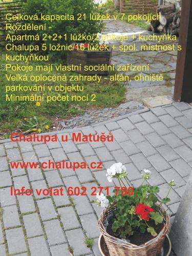 a page of a poem with a plant in a pot at Chalupa u Matúšů Jeseníky in Dolní Moravice
