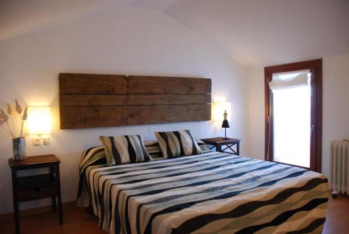 Ένα ή περισσότερα κρεβάτια σε δωμάτιο στο Arriba y abajo