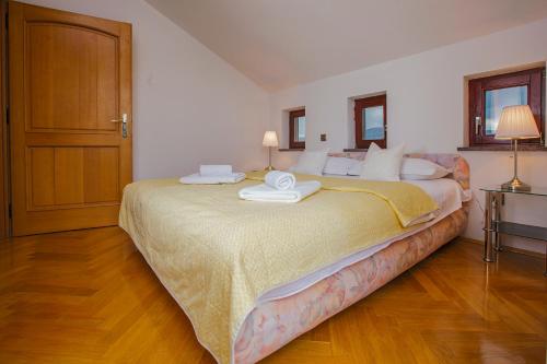 Posteľ alebo postele v izbe v ubytovaní Apartments Dilber
